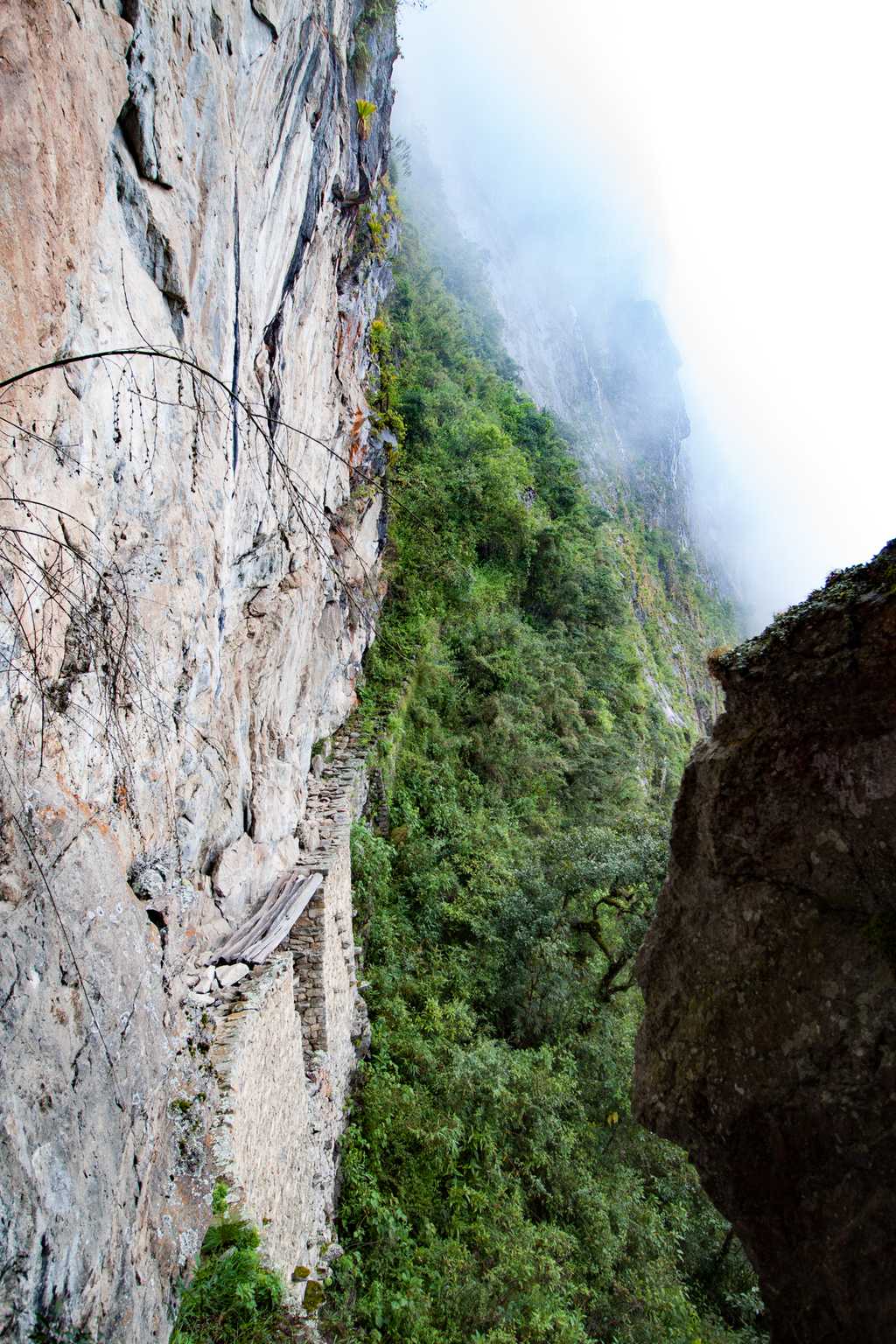 This insane bridge carved into a shear cliff apparently led to Vilcabamba, the last Inca city